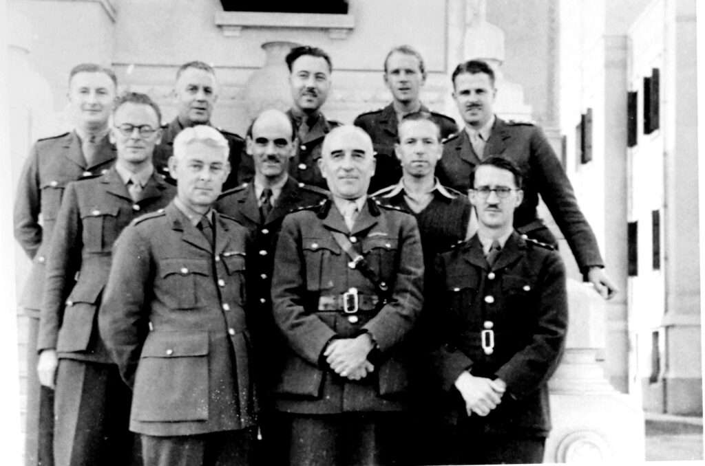 Dr Longmore (centre), former GP CO Hospital